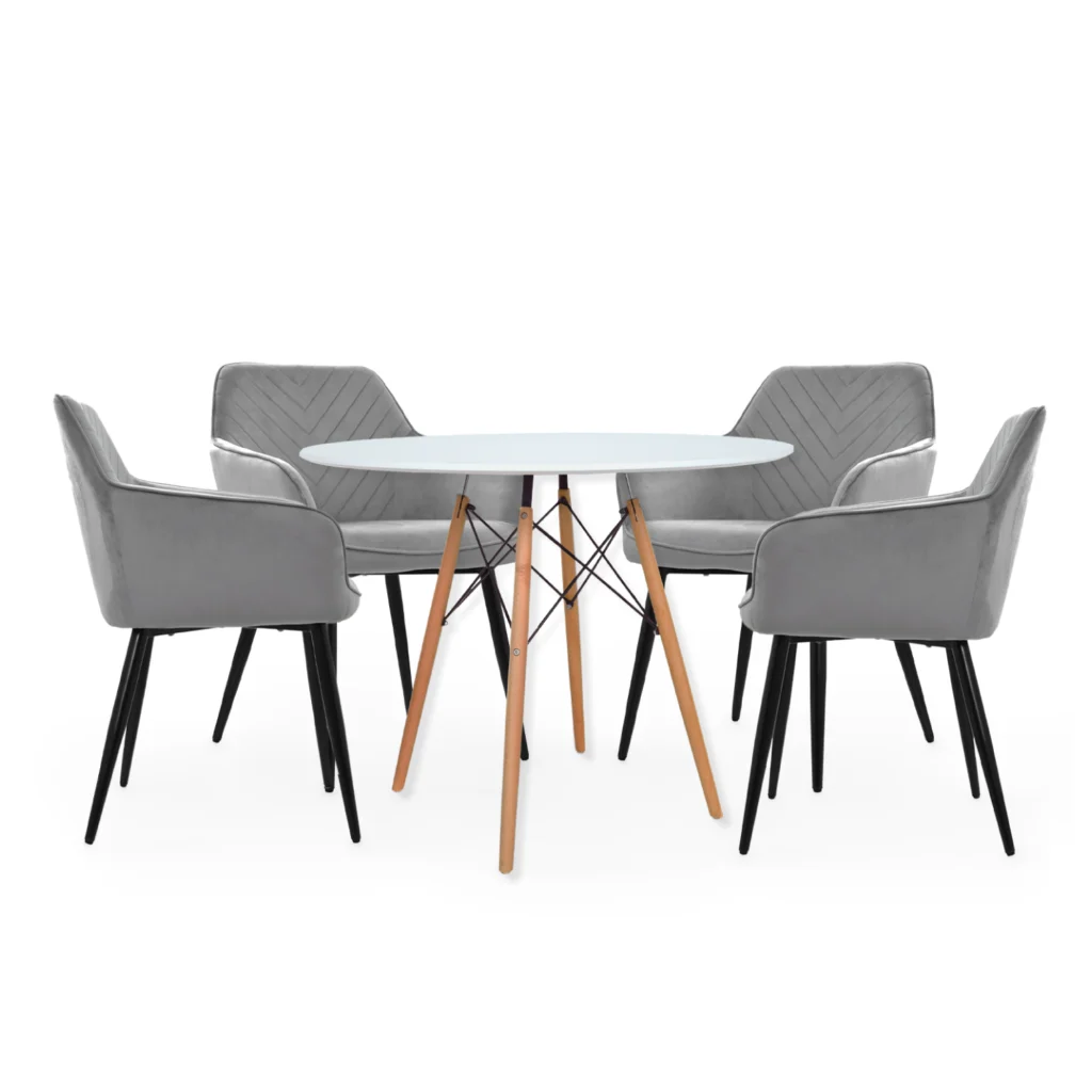 El juego de comedor Owen con mesa redonda en MDF y 4 sillas tapizadas en terciopelo. Diseño moderno, elegante y perfecto para tu hogar.
