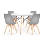 Juego de comedor Sevilla con mesa redonda moderna y cuatro sillas con asiento tapizado para espacios elegantes y contemporáneos.