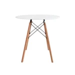 Mesa redonda Eames con estructura moderna y patas en madera para espacios contemporáneos.