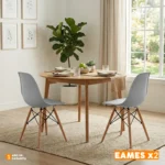 Set x2 sillas de comedor Eames con patas en madera y diseño moderno para comedores contemporáneos.