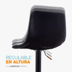 El butaco Jack con monoconcha tapizada en cuero sintético, base giratoria y reposapiés metálico regulable en altura.